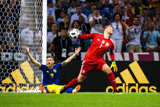 Marcus Berg of Sweden reacts next to goalkeeper Manuel