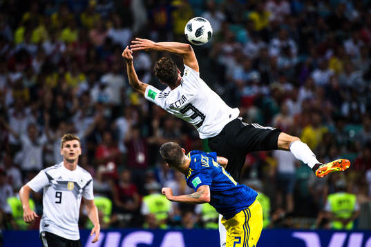 Mikael Lustig of Sweden and Jonas Hector of Germany