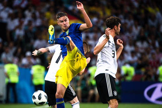 Mikael Lustig of Sweden and Jonas Hector of Germany