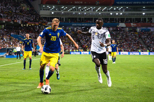 Ola Toivonen of Sweden and Sami Khedira  of Germany