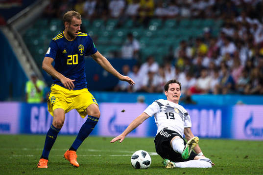 Ola Toivonen of Sweden and Sebastian Rudy of Germany