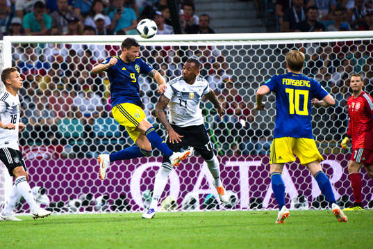 Marcus Berg of Sweden and Marco Reus of Germany