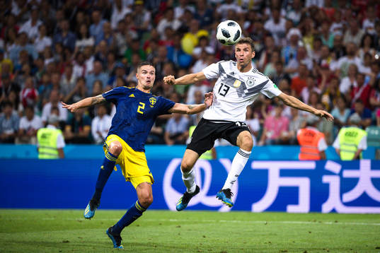 Mikael Lustig of Sweden and Thomas Müller of Germany