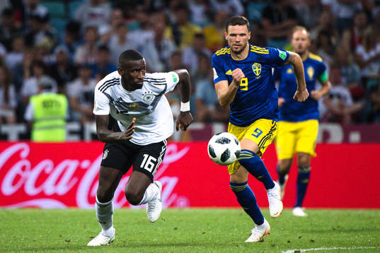 Antonio Rüdiger of Germany and Marcus Berg of Sweden