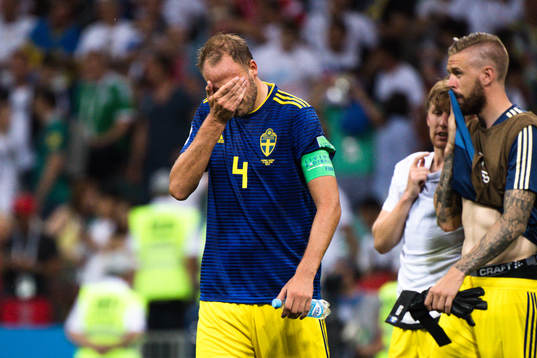 Andreas Granqvist of Sweden looks dejected