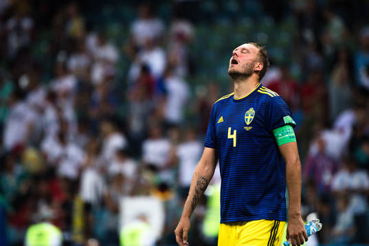 Andreas Granqvist of Sweden looks dejected