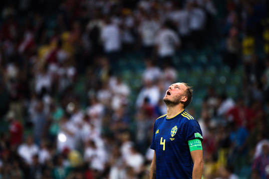 Andreas Granqvist of Sweden looks dejected