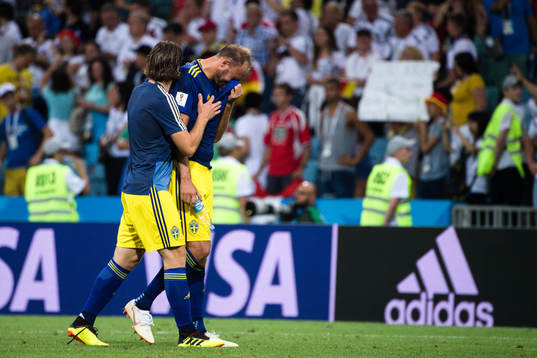 Gustav Svensson and Andreas Granqvist of Sweden looks