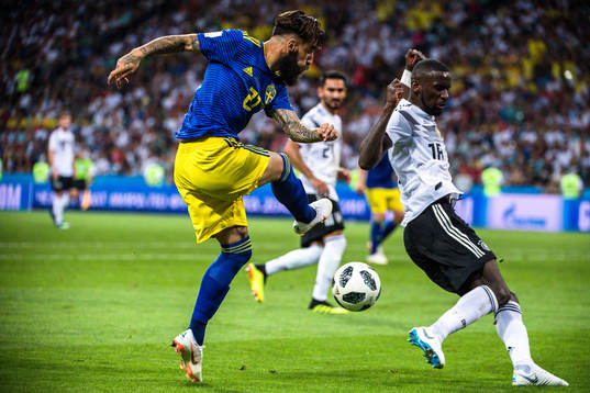 Jimmy Durmaz of Sweden and Antonio Rüdiger of Germany