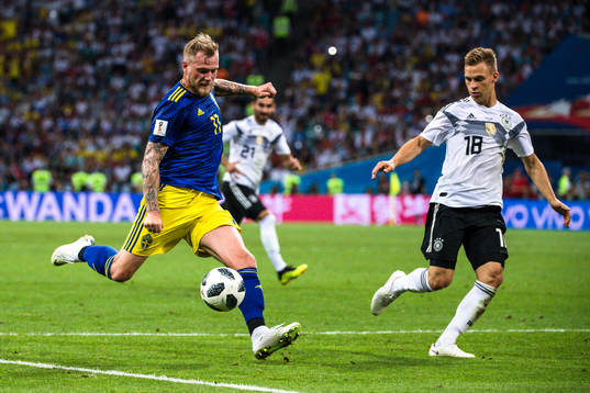 John Guidetti of Sweden and Joshua Kimmich of Germany