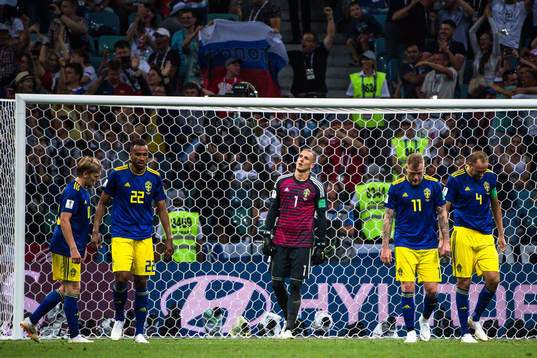 Players of Sweden looks dejected