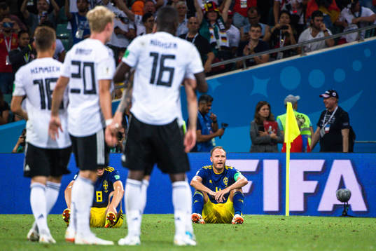 Andreas Granqvist,of Sweden looks dejected