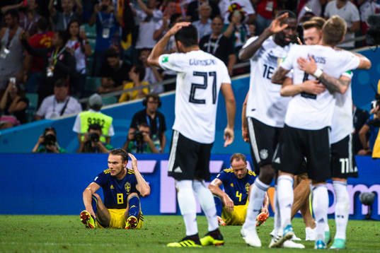 Albin Ekdal and Andreas Granqvist of Sweden looks dejected