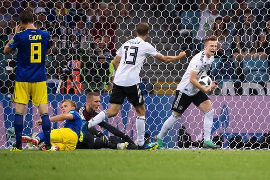 Thomas Müller and Marco Reus of Germany celebrates