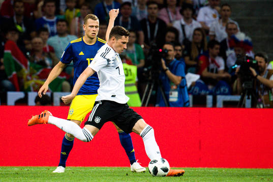 Viktor Claesson of Sweden and Julian Draxler of Germany
