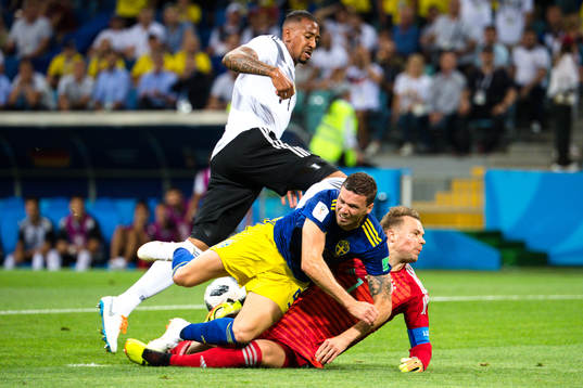 Marcus Berg of Sweden against goalkeeper Manuel Neuer of