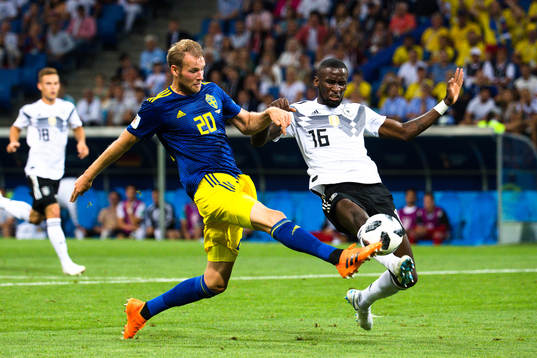 Ola Toivonen of Sweden and Antonio Rüdiger  of Germany
