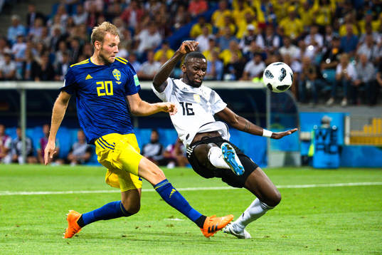 Ola Toivonen of Sweden scores the 1-0 goal next to Antonio