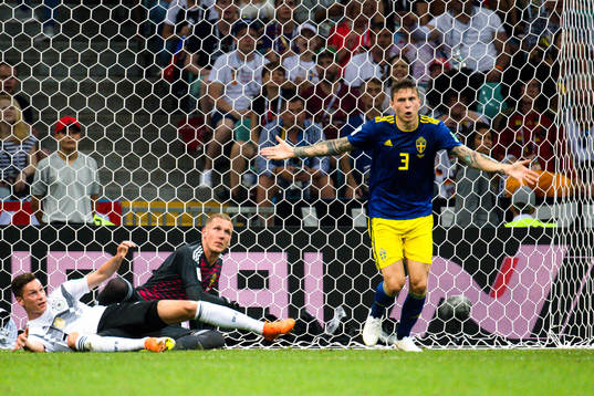 goalkeeper Robin Olsen and Victor Nilsson Lindelöf of