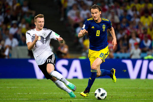 Marco Reus  of Germany and Albin Ekdal of Sweden
