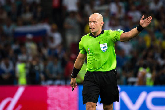 referee Szymon Marciniak
