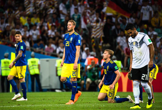 Ola Toivonen and Emil Forsberg of Sweden looks dejected