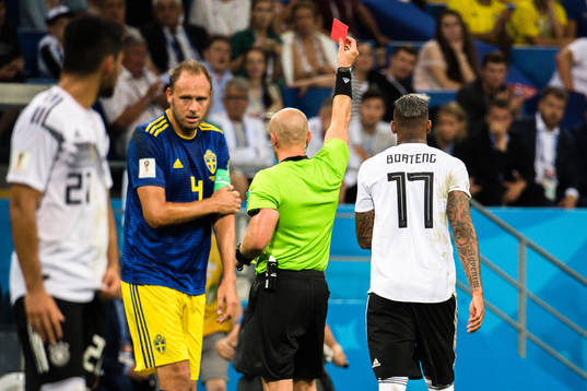 Jerome Boateng of Germany receives a red card from referee