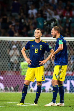 Albin Ekdal and Andreas Granqvist of Sweden looks dejected