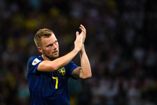 Sebastian Larsson of Sweden looks dejected