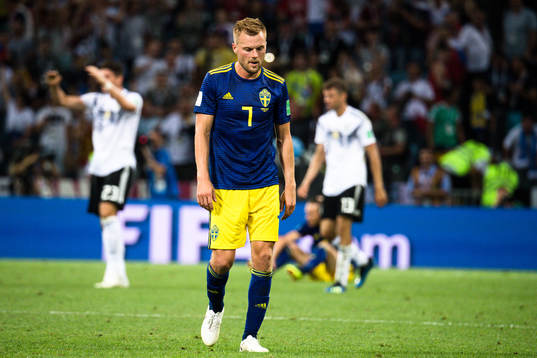 Sebastian Larsson of Swedenlooks dejected