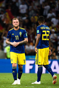 John Guidetti and Isaac Kiese Thelin of Swedenlooks dejected