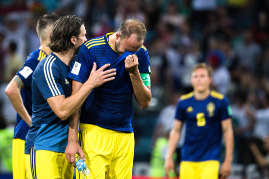 Andreas Granqvist of Sweden looks dejected