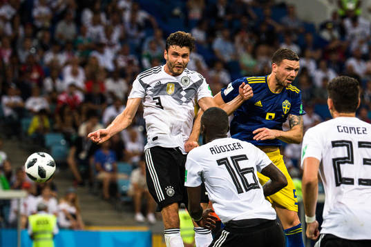 Jonas Hector of Germany and Marcus Berg of Sweden