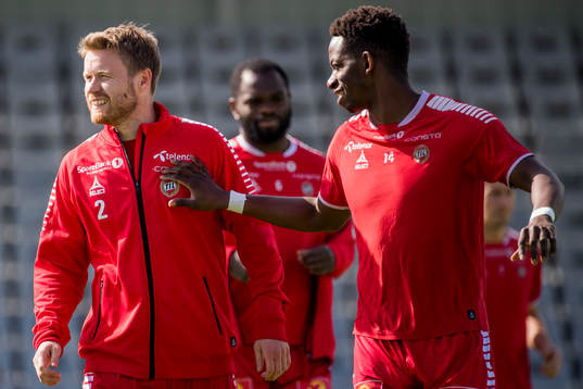 Tom Høgli and Mushaga Bakenga of Tromsø