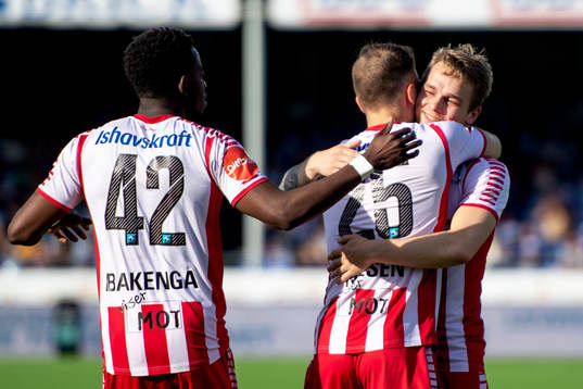 Lasse Nilsen of Tromsø celebrates with his teammates