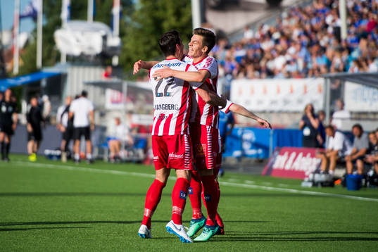 Jostein Gundersen of Tromsø celebrates with his teammate