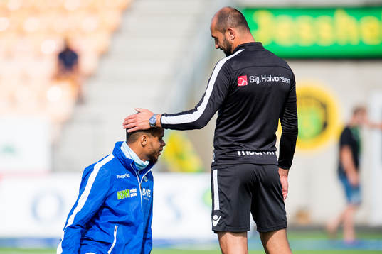 Erixon Danso of Sandnes Ulf and Bojan Zajic, assistant