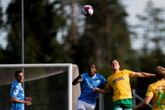 Akinsola Akinyemi of Sandnes Ulf and Ole Andreas Nesset of