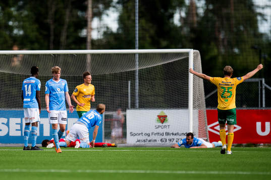 Andreas Dybevik of Sandnes Ulf looks dejected while players