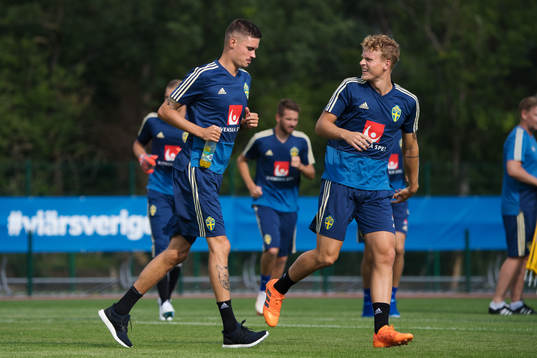 Mikael Lustig and Oscar Hiljemark of the Swedish national