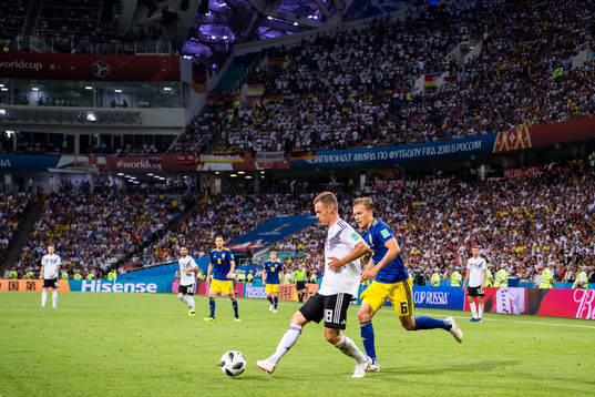 Joshua Kimmich of Germany and Ludwig Augustinsson of Sweden
