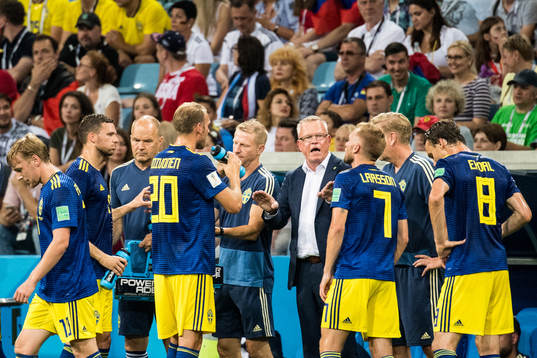 Head coach Janne Andersson of Sweden talks with the players