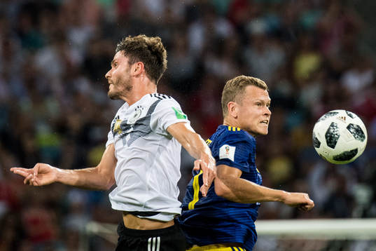 Jonas Hector of Germany and Viktor Claesson of Sweden