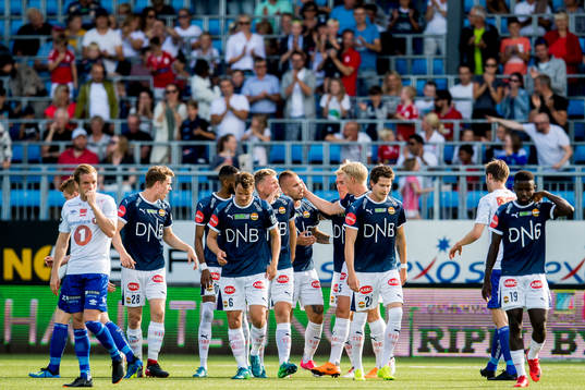 Marcus Pedersen of Strømsgodset celebrates with teammates