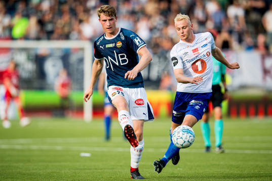 Marius Høibråten of Strømsgodset and Sondre Sørløkk of