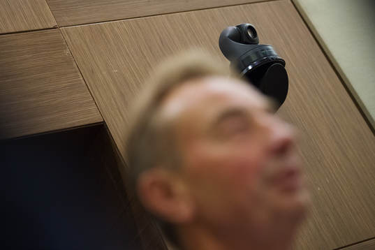 A security camera behind scout Tom Prahl of the Swedish