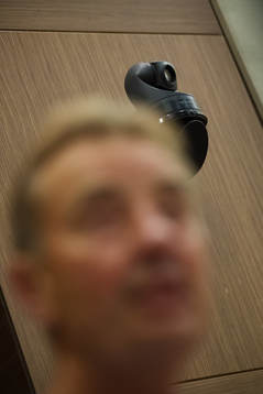 A security camera behind scout Tom Prahl of the Swedish