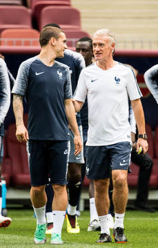 Antoine Griezmann and head coach Didier Deschamps of France