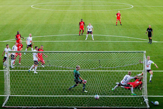 Bismar Acosta of Brann scores 1-0 behind goalkeeper Sondre