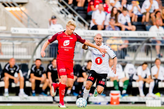 Sivert Heltne Nilsen of Brann and Jone Samuelsen of Odd